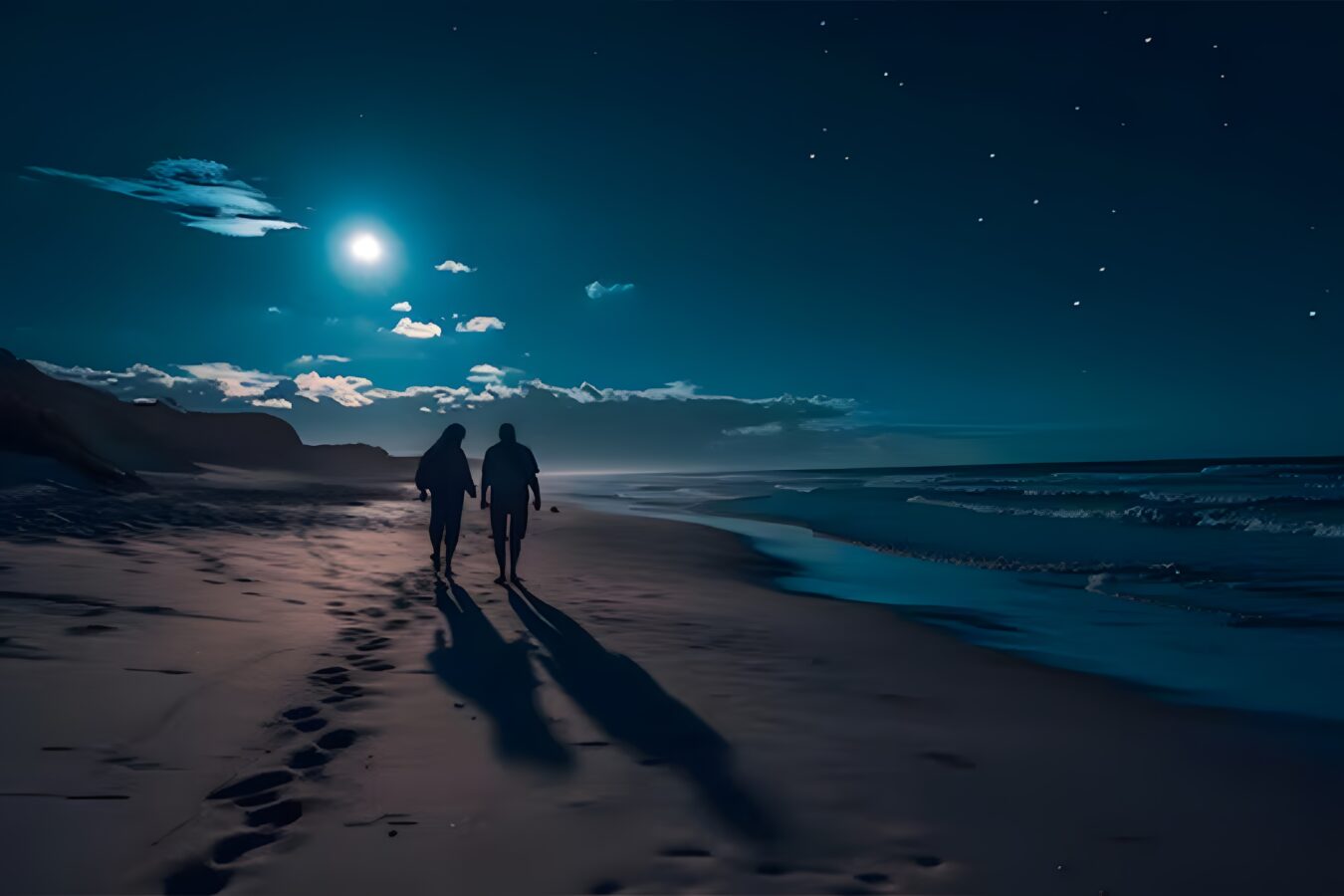 Moonlit beach in Phuket with calm waters, boats, and starlit sky.