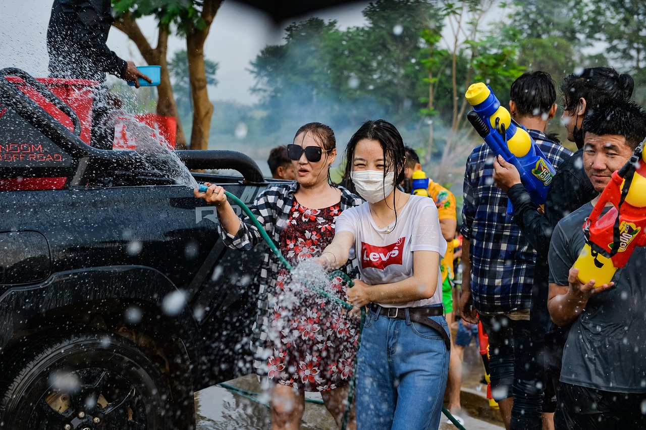 People participating in water fights during Songkran