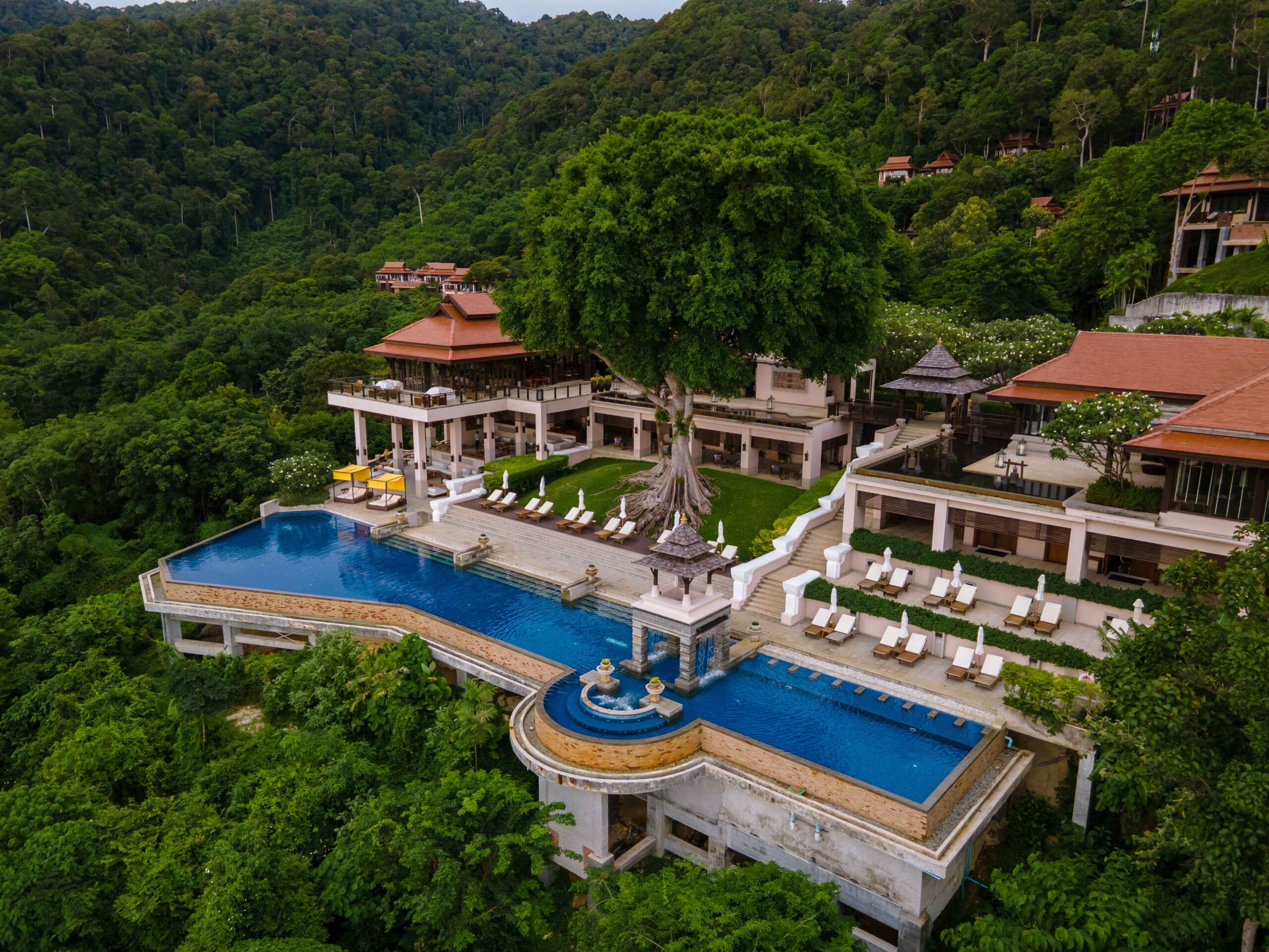 A luxurious beachfront villa with a private pool overlooking the Andaman Sea